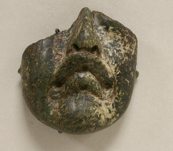 Green serpentinite Olmec mask fragment in The Met collection